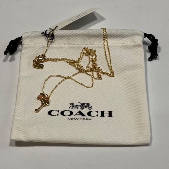 COACH New-York 15.5-17.5 in. Gold Tone C Key Pendant Layered Necklace - Picture 2 of 2